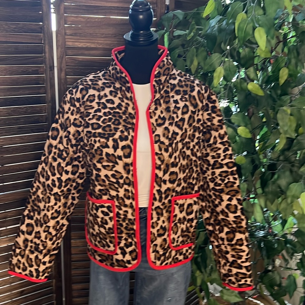 Quilted leopard print jacket with red trim! Super cute